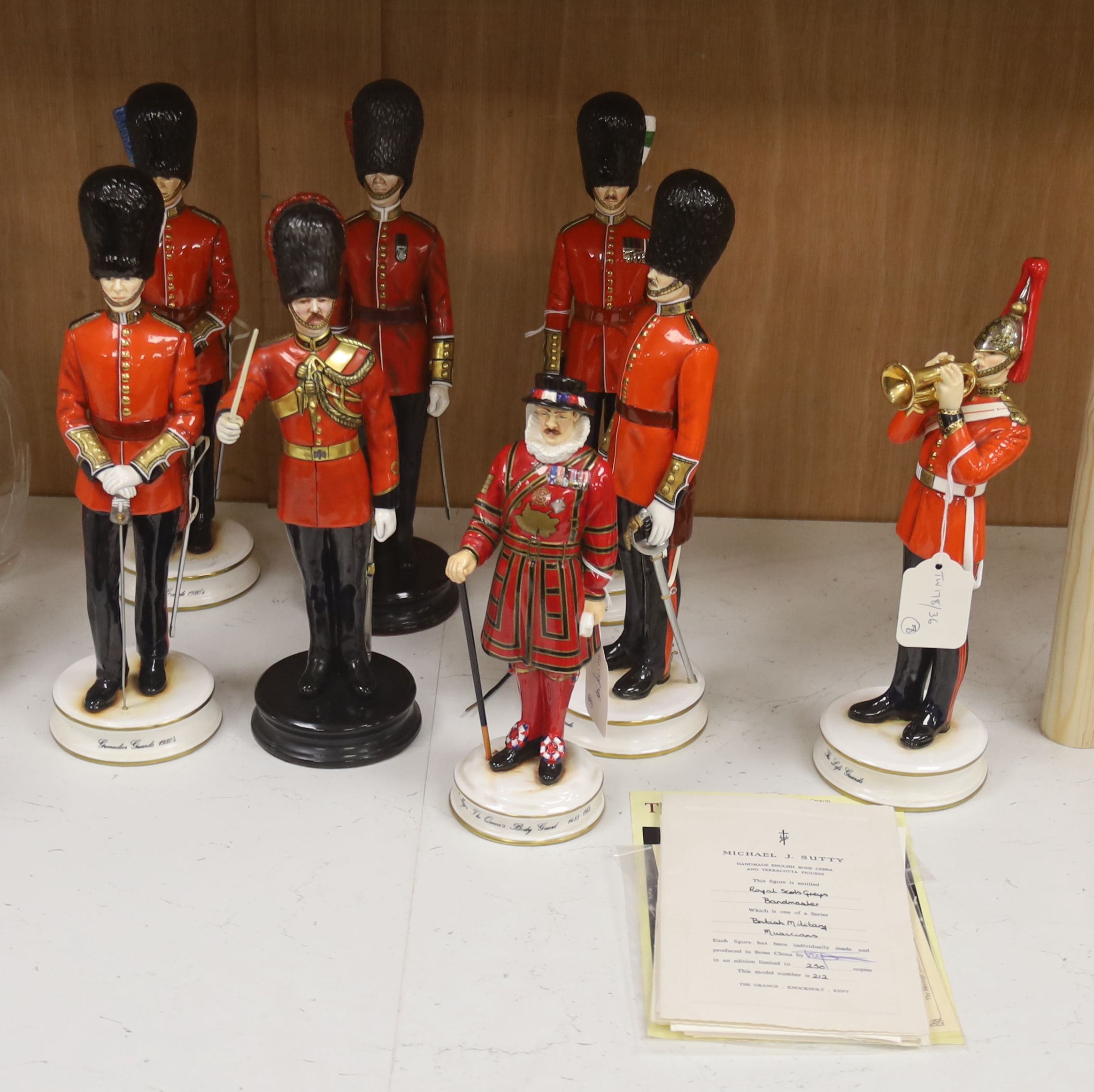 Eight limited edition ceramic figures by Michael Sutty, comprising 'Grenadier Guards 1980's', no. 221/250